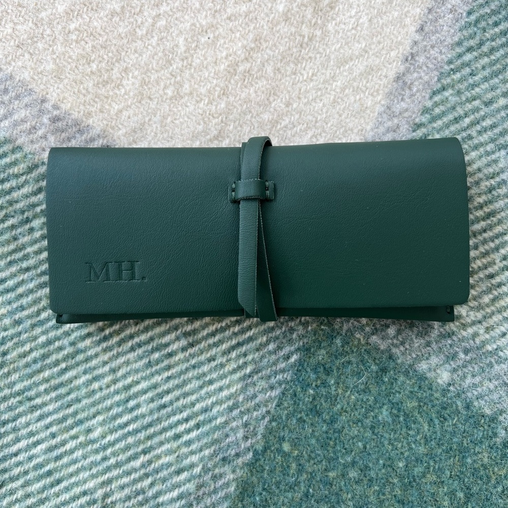 New elegant watch pouch - case with strap closure.